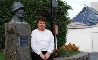  ?? Peggy O’Connell pictured in Finuge on with the, almost, rehabilita­ted Finuge village centre in the background. ??