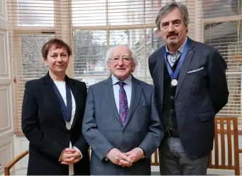  ??  ?? Anne Enright, President Michael D Higgins, and Sebastian Barry at the announceme­nt of Laureate for Irish Fiction 2018-2021 in Dublin yesterday. Photo: Maxwells