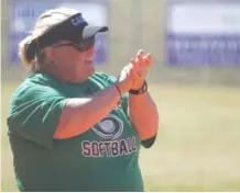  ?? STAFF FILE PHOTO BY C.B. SCHMELTER ?? East Hamilton softball coach Norma Nelson won her 800th career game on Monday. East Hamilton won 14-1.