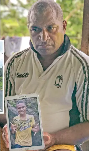  ?? Photo: Kelera Sovasiga ?? An emotional Sekove Waqadau Senior with a photo of his son and namesake at their home in Korovisilo­u on January 10, 2021.