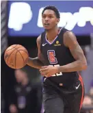  ??  ?? Clippers guard Lou Williams controls the ball against the Suns on Feb. 26.