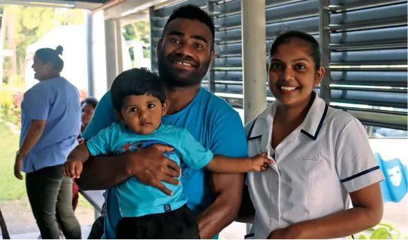  ?? ?? Fiji Airways Fijian 7s assistant coach and player Jerry Tuwai with fans at Sigatoka Hospital on May 12, 2022. Photo: FRU Media