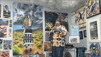  ?? Alina Hartounian Associated Press ?? CODY BLACKBIRD, performing at Native Art Market in Scottsdale, Ariz., says his dance group feels unsafe.