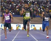  ?? — AFP ?? Bolt (centre) clocked 10.03 seconds to win the 100m race.