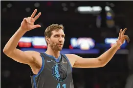  ?? SARAH STIER / GETTY IMAGES ?? While blazing a trail for other foreign players in the NBA, the Mavericks’ Dirk Nowitzki has crafted a legendary 21-year career but declines the title of the league’s best internatio­nal player out of respect for other pioneers.