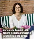  ?? ?? Mariastell­a Gelmini (48), Italiens Regionalmi­nisterin, strahlte bei dem Treffen.