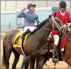  ?? The Sentinel-Record/RICHARD RASMUSSEN ?? Magnum Moon and jockey Luis Saez won the $900,000 Grade II Rebel Stakes on Saturday at Oaklawn Park in Hot Springs.