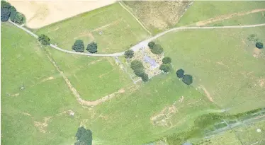  ?? CROWN COPYRIGHT RCAHMW ?? Parch marks of Roman buildings at Caerhun Roman fort in the Conwy Valley