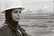  ?? Nabil al-jourani / Associated Press ?? Petrochemi­cal engineer Ayat Rawthan, 24, is among trailblaze­rs in the fields of Iraq’s oil industry. She hopes to help establish a union to bring like-minded Iraqi female engineers together.