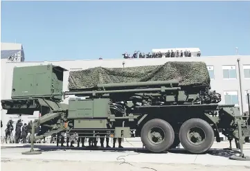  ??  ?? Pence inspects the Patriot Advanced Capability-3 (PAC-3) missile launch system with Itsunori Onodera, Japan’s defence minister at the Ministry of Defence in Tokyo, Japan. photo