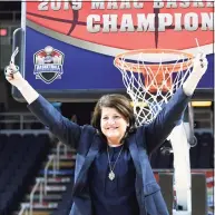  ?? Hans Pennink / Associated Press ?? Quinnipiac coach Tricia Fabbri cuts a section of the net after a win over Marist in the MAAC Tournament in March 2019.