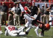  ?? MARK LOMOGLIO - THE ASSOCIATED PRESS ?? Jarvis Landry is upended by Buccaneers outside linebacker Kwon Alexander (58) after a reception during the first half Oct. 21 in Tampa, Fla.