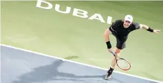  ?? — AFP photo ?? World number one Andy Murray of Great Britain returns the ball to France’s Lucas Pouille during their ATP semi-final tennis match as part of the Dubai Duty Free Championsh­ips on March 3, 2017.