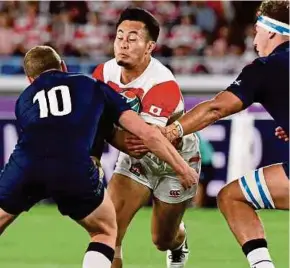  ?? AFP PIC ?? South Africa’s Cheslin Kolbe is full of praise for try-scoring Japan winger Kenki Fukuoka (centre) in the on-going World Cup.