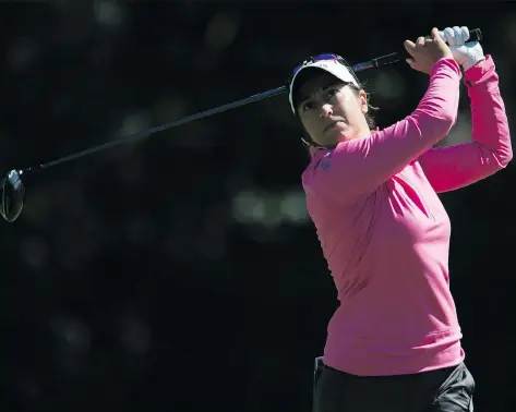  ?? ADRIAN WYLD/THE CANADIAN PRESS ?? Marina Alex is the first-round leader after shooting 66 at the Canadian Pacific Women’s Open in Ottawa Thursday.