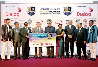  ??  ?? Amali Nanayakkar­a, Group Chief Marketing Officer, Dialog Axiata PLC handing over sponsorshi­p cheque to B.A. Abeyratne Principal, Royal College, Colombo and Rev. Fr. Marc Billimoria - Warden, S.. Thomas’ College, Mt. Lavinia. Also in picture from left -...