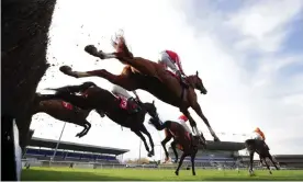  ?? Photograph: Getty Images ?? Recent racedays at Kempton Park have seen false rails in place to guide runners around the spot where the fence should be.