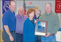  ?? ELISHA MORRISON/ The Saline Courier ?? The Bryant Rotary Club, represente­d by Emil Woerner, left, and Pat Baker, center, presents the family of the late Bettye Tucker with a plaque in her honor. Accepting are Randy Tucker, second left, Susan Blue, second right, and Billy Tucker.