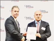  ??  ?? (Left): Group CEO Mazin Al-Nahedh receiving an award from Global Finance, (center), Group Chief Retail and Private Banking Officer Waleed Mandani receiving an award from IFN, (right),