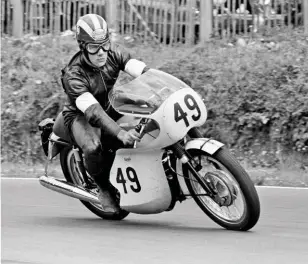  ??  ?? LEFT: Simon Wilson with GTR 51D – his 1966 Triumph Bonneville T120 Thruxton racer LEFT: Rex Butcher at the Brands Grand Prix d’endurance in 1966 – the team won by 10.4 seconds