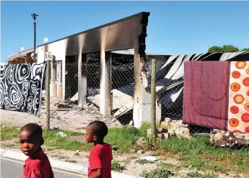  ?? PICTURE: PHANDO JIKELO/AFRICAN NEWS AGENCY (ANA) ?? DESTROYED: Housing offices that were burnt and looted by protesting Zwelihle residents in Hermanus. The residents are demanding vacant land to build shacks, after waiting a long time for houses. Library and municipal offices were also burnt and...