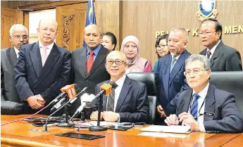  ??  ?? Rozman (seated left ) speaking at a press conference after paying a courtesy call on Shafie at PPNS yesterday.