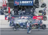  ?? JAMIE SQUIRE/GETTY IMAGES ?? William Byron, driver of the No. 24 Chevrolet, pits during last Sunday's race at Indianapol­is Motor Speedway. He'll be racing today in Sparta, Kentucky.