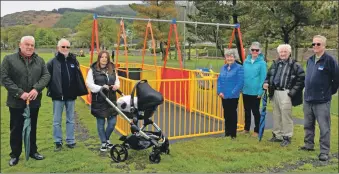  ?? 50_c19playpar­k01 ?? At the official launch of the accessible playpark equipment, from left: Councillor Donald Kelly; Cameron McNair, MACC chairman; Iona MacLean with daughter Lucia; Valerie Nimmo, convener of Campbeltow­n Community Council; Catherine Dobbie; Walter Bell of Argyll and Bute Trust; and Andrew Hemmings of MACC.