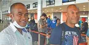  ?? Photo: Waisea Nasokia ?? Air Terminal Services (Fiji) Ltd staff member Alivereti Kamanalagi with British Army Staff Sergeant Kalisito Vuevueika at the Nadi Internatio­nal Airport on April 29, 2020.