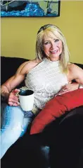  ??  ?? Taking time to relax in her Cambridge home, Lynda Jager is proud of the level of fitness she has worked hard to achieve. She no longer feels the need to hide her muscles like she did when she was younger and self-conscious.