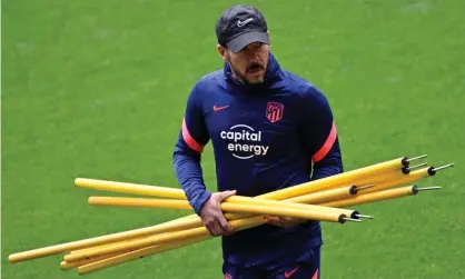  ?? City. Photograph: Pierre-Philippe Marcou/AFP/Getty Images ?? Atlético Madrid’s manager, Diego Simeone, at a training session on Tuesday to prepare for the Champions League game against Manchester