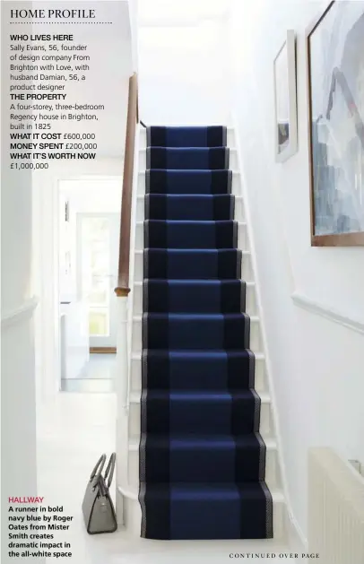  ??  ?? HALLWAY
A runner in bold navy blue by Roger Oates from Mister Smith creates dramatic impact in the all-white space