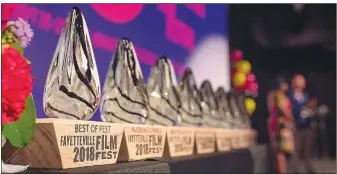  ?? Courtesy Photo ?? Fayettevil­le Film Festival trophies await distributi­on.