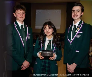  ?? ?? Youngsters from St Luke’s High School, in Barrhead, with their award