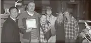  ?? Contribute­d photo ?? Drug Court Judge Meng Lim stands with graduate Jeff and his family during a graduation ceremony this month.