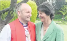  ??  ?? Childhood shock: Bishop Alan Abernethy (also below) with wife his Liz