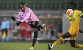  ??  ?? Mamoudou Karamoko curls in Lask’s third goal to secure a point for his team against Tottenham. Photograph: Christian Bruna/EPA