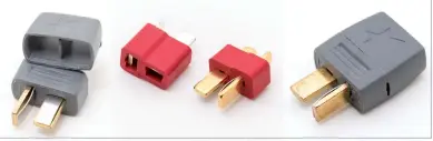  ??  ?? The original red Deans Ultra connector and an improved version of the Star Plug. The Star Plug has grips molded into the plastic and a segmented cover for the solder connection­s that helps prevent wire contact.