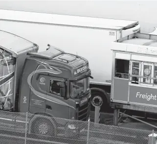  ?? PHIL NOBLE • REUTERS ?? A lorry goes through the freight check in lane as it arrives at the port of Holyhead on the island of Anglesey, Britain on Monday.