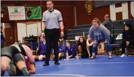  ??  ?? Assistant coach Kylie Wingler, Head Coach Corrina Christians­en and girls bench watch Lady Cat in action.