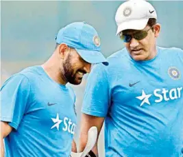  ??  ?? Indian captain M S Dhoni with coach Anil Kumble in a practice session in Vishakapat­nam on Friday