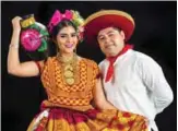  ??  ?? Ana Cinthia Quintana (left) and Antonio Perez, from Asuncion Ixtaltepec, pose during a rehearsal.