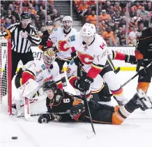  ?? HARRY HOW/ GETTY IMAGES ?? Mikael Backlund and the Calgary Flames spent too much time killing penalties Thursday against the Anaheim Ducks, a problem the team struggled with early in the regular season.