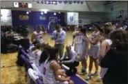  ?? NATE BARNES — THE NEWS-HERALD ?? Perry coach Roy Infalvi addresses the Pirates during a regional semifinal against Akron St. Vincent-St. Mary on March 5.