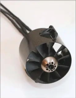  ??  ?? The 10-blade fan sounds fantastic. This picture shows the very tight tolerance between the fan blades and shroud.