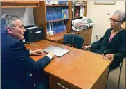  ?? KATHY YOUNG / AP ?? Adine Usher, 78, meets with breast cancer study leader Dr. Joseph Sparano at the Montefiore and Albert Einstein College of Medicine in New York City.