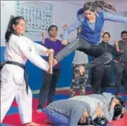  ?? PHOTOS: MANOJ VERMA/HT ?? Women preparing to join Delhi Police show off their selfdefenc­e moves