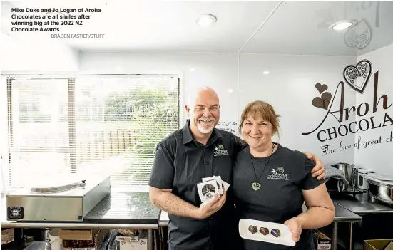  ?? BRADEN FASTIER/STUFF ?? Mike Duke and Jo Logan of Aroha Chocolates are all smiles after winning big at the 2022 NZ Chocolate Awards.