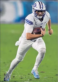  ?? GETTY IMAGES FILE ?? BYU quarterbac­k Zach Wilson has shot up some draft boards.