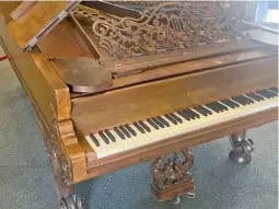  ?? ?? It is believed that only six of the 1866 Model D full concert Steinway pianos were made, and appraisers could only find one similar to the one donated to Lee University, pictured here Friday, in existence.